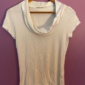White Medium short sleeve Tahari top with elegant neckline.